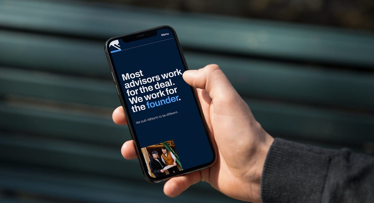 Phone with 48north website on the screen